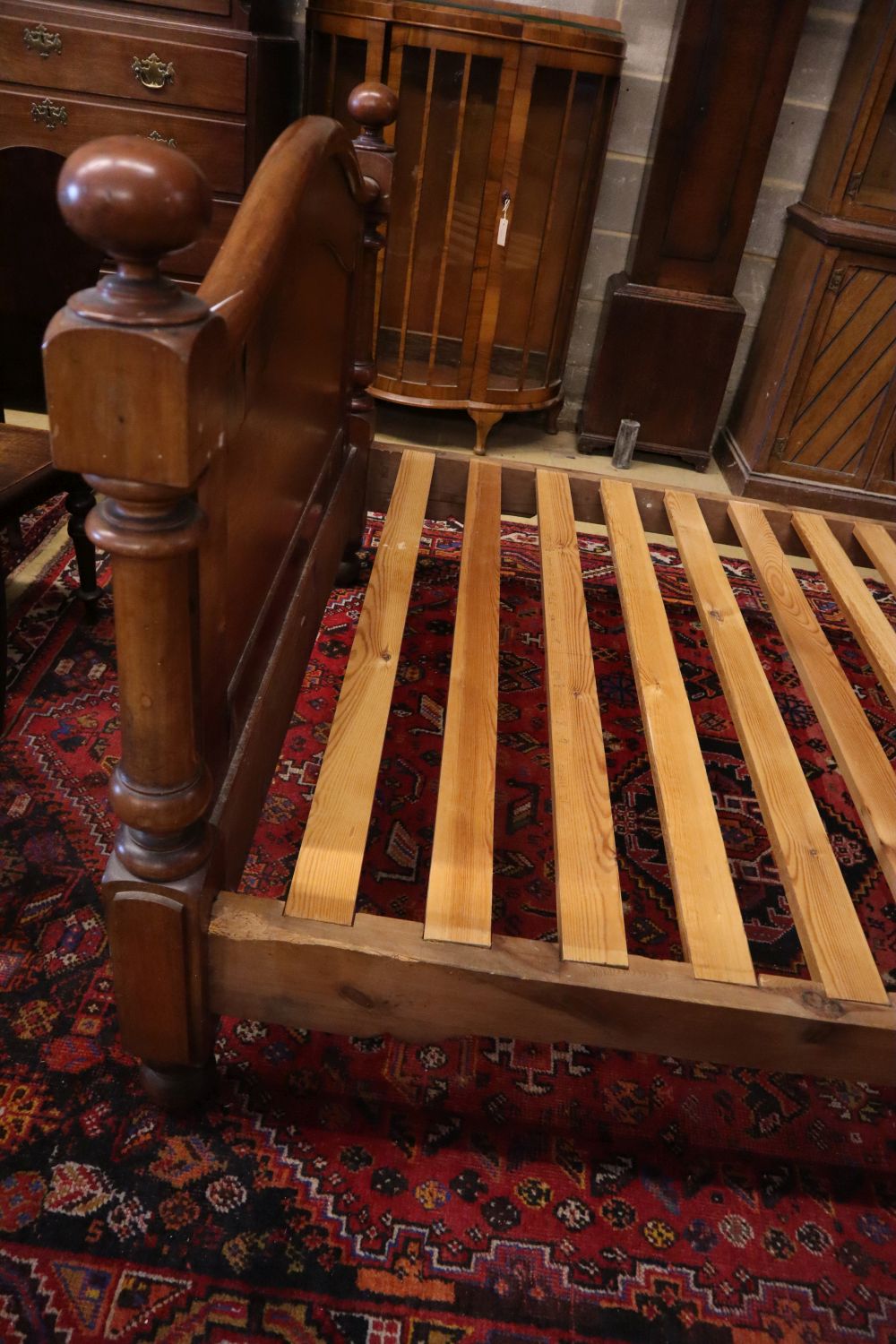 A Victorian mahogany three quarter size head and foot bedstead, width 137cm